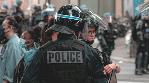 Riot police with shield